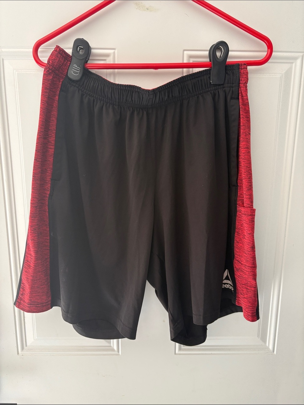 Reebok Black Athletic Shorts with Red Side Panels